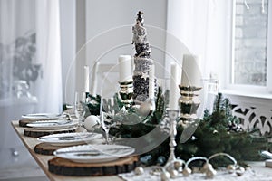 Table served for Christmas dinner in living room