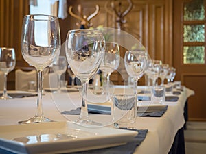 Table served with glasses in the restaurant.