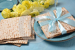 Table served for Passover Pesach indoors, with matzah bread