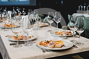 Table served for a wine tasting. Snacks with Pasta, Cheese, Vegetables. Spain tapas recipe food pintxos. Served dish for