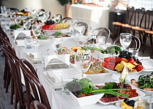 Table set for an event party or wedding reception in a restaurant.