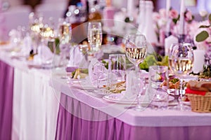 Table set for an event party or wedding reception. Wedding table setting. wine glasses