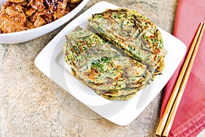 Table set for Korean Green Pancakes and barbequed pork