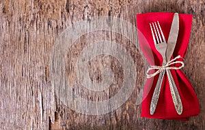 table set with red napkin.