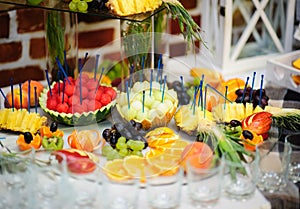 table set service with silverware and glass stemware at restaurant before party