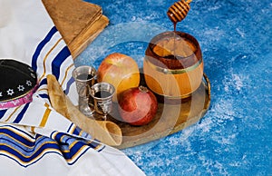 Table set with traditional food for Jewish New Year Holiday, Rosh Hashana