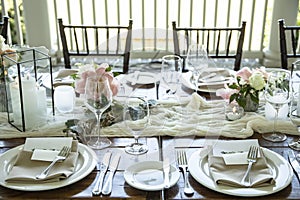 Table set up for outdoor wedding reception with elegant decor