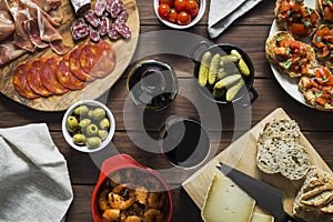 Table set with various tapas dishes and wine