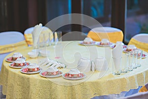 table set for wedding or another catered event dinner, luxury wedding table setting for fine dining at indoors.