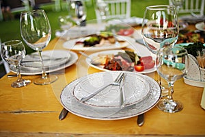 Table set for wedding or another catered event dinner in a restaurant