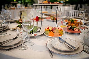 Table set for wedding or another catered event dinner in a restaurant