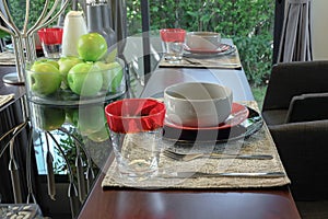 Table set on wooden dining table in modern style dining room