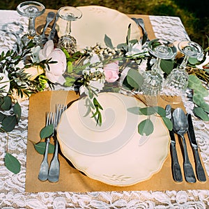 Table setting for banquet with flowers, void