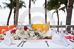 Table setting at beach restaurant.