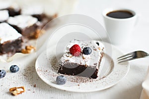 Table setting, coffee and chocolate dessert brownie cake