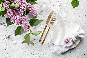 table setting dinner with lilac flower. Summer celebration, wedding greeting card, invitation concept