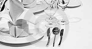 Table setting  Dinner plate in restaurant, black and white photo