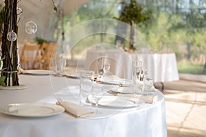 Table setting element empty plates with cutlery on white tablecloth