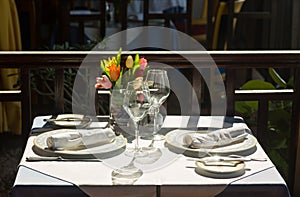 Table setting exterior restaurant in sunshine