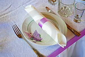 Table setting for fine dining or party. cutlery and plate inrestaurant set up for wedding celebration photo