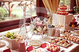 Table setting with flowers and sweets