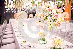 Table setting at a luxury wedding and Beautiful flowers