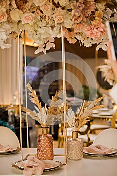 Table setting at a luxury wedding and Beautiful flowers on the table