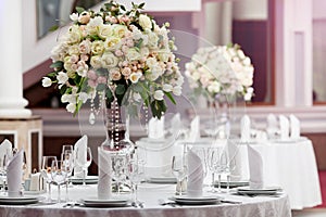 Table setting at a luxury wedding reception