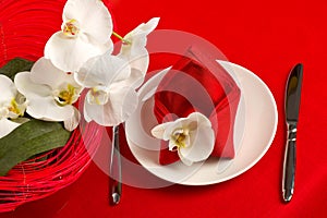 Table setting with orchid flowers