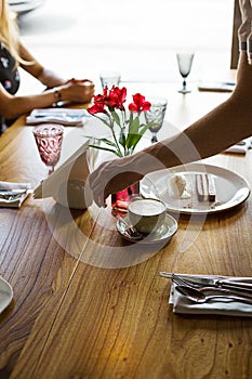 Restaurant, lunch time. Dinner table with plates and utensils.
