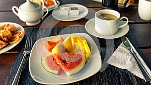 Table setting with vegan food and coffee in restaurant outdoor