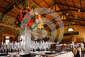 Table setup, wedding guest table, reception layout in pantone living coral