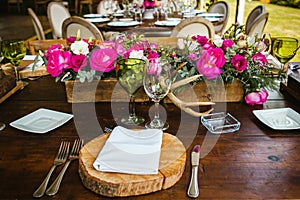 Table setup, wedding guest table, reception layout in pantone living coral