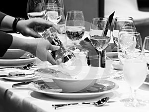 Table side service at a fine dining restaurant, Waiter serving dishes to the table