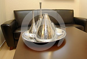 Table with silver decanters photo