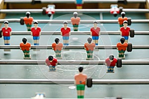 Table soccer players from top down