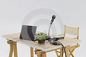 Table for speakers with notebook