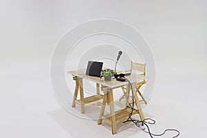 Table for speakers with notebook