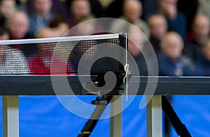 Table tennis against view of a stadium