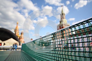 Table tennis net against the Kremlin.