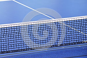 Table tennis net with blue table