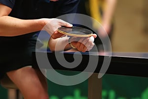 Table tennis player serving