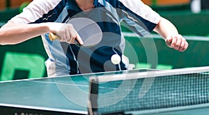 Table tennis player serving