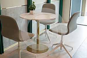 Table and three chairs. Modern minimal interior design