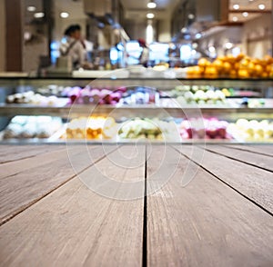 Table top with Blurred Bar with fresh Fruit Display on background