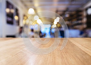 Table top with Blurred Bar restaurant cafe interior background