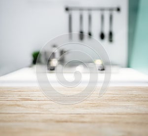 Table Top with Blurred Kitchen Counter Home Interior Background photo