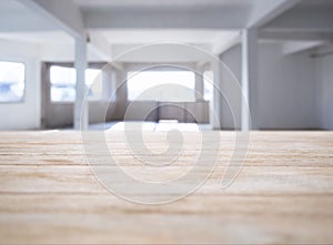 Table top with Blurred Loft space Interior background