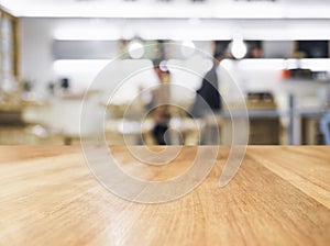 Table top with blurred People and kitchen background