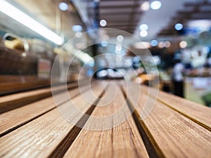 Table top with Blurred Retail shop store Background